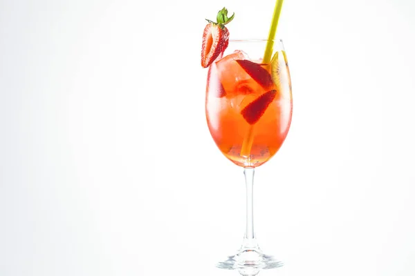 An alcohol drink with a straw on white background — Stock Photo, Image