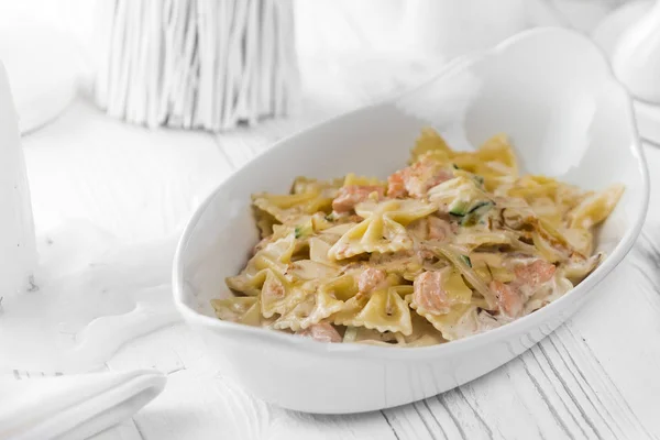 Tasty pasta dish with meat and cheese — Stock Photo, Image