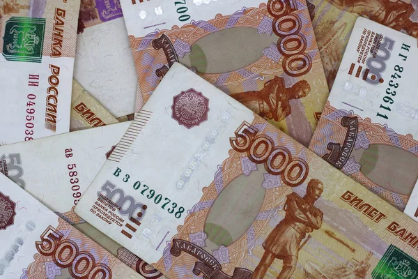 lots of Russian money. banknotes come in denominations of five thousand. banknotes close-up.