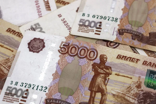 lots of Russian money. banknotes come in denominations of five thousand. banknotes close-up.