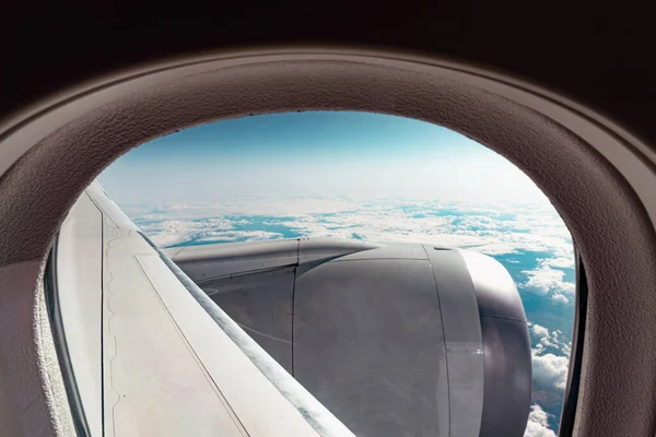 Cloudy view through the aircraft window