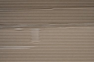 Oluklu kağıt üst görünüm arkaplanı. Paketleme için katmanlı kağıt dokusu. Paketleme için kahverengi kağıt.