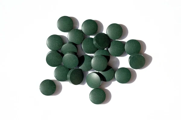 Green Pills White Background Top View Chlorella Tablets Food Supplements — Stock Photo, Image
