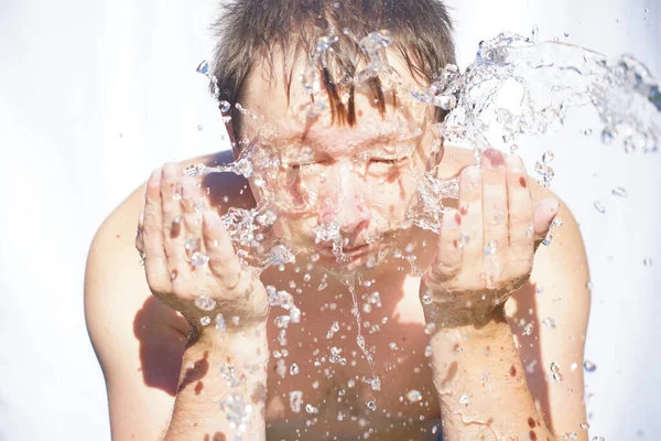 Guy Washes His Face Water Drops Fly Different Directions White Stock Image