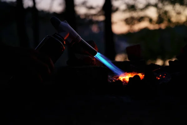 Hand Holds Manul Gas Burner Firewood Night — Stock Photo, Image