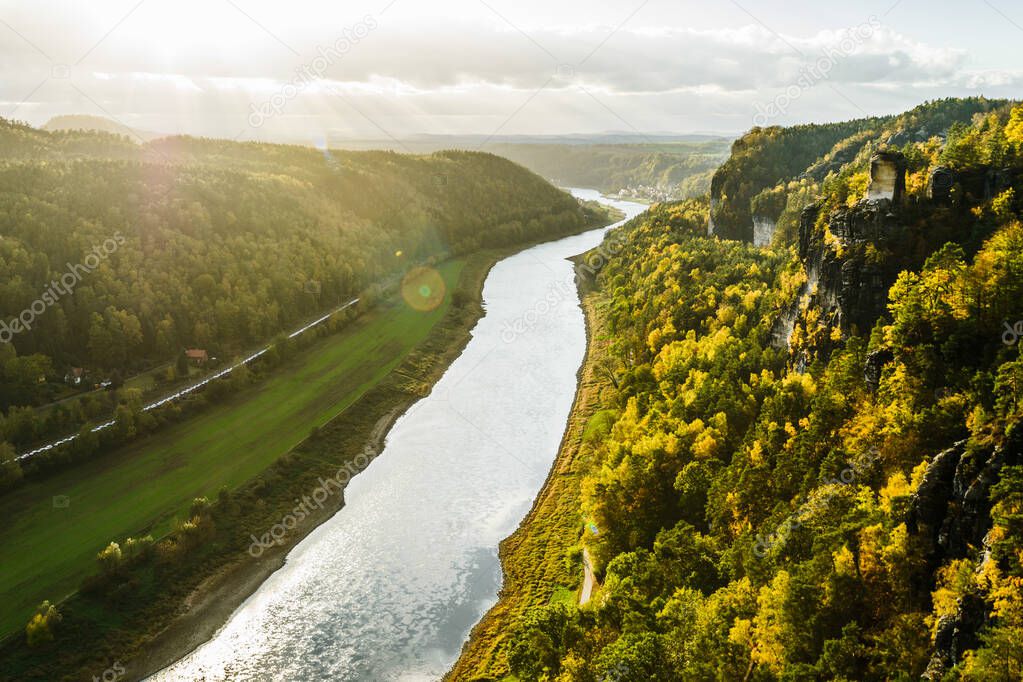 Picturesque autumn sunset scenery of Elbe river from Bastei bridge and Sandstone mountains, Saxon Switzerland National Park near Dresden, Germany