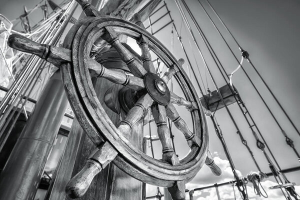 steering wheel against a blue sky