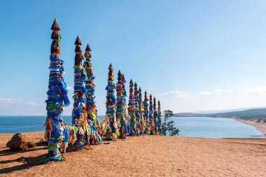 Ritual shaman pillars on Olkhon island clipart