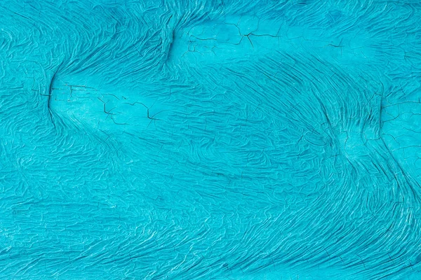 Unevenly painted surface of blue color with cracks — Stock Photo, Image