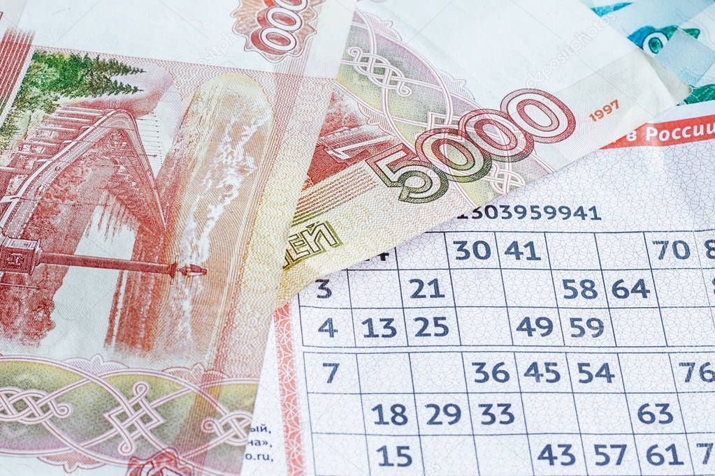 Lottery ticket and money, background