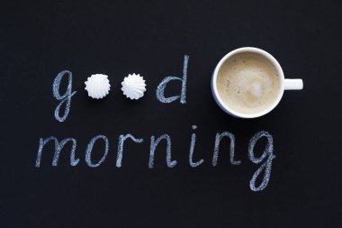 Text Good morning with chalk on black background clipart