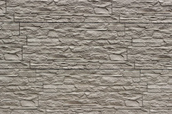 Oberfläche Der Dekorativen Wand Aus Künstlich Aufgerissenem Stein Brauntönen — Stockfoto
