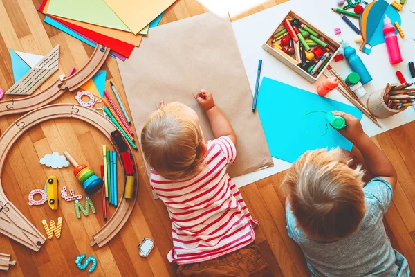 Kids draw and make crafts. Kindergarten or preschool background. — Stock Photo, Image