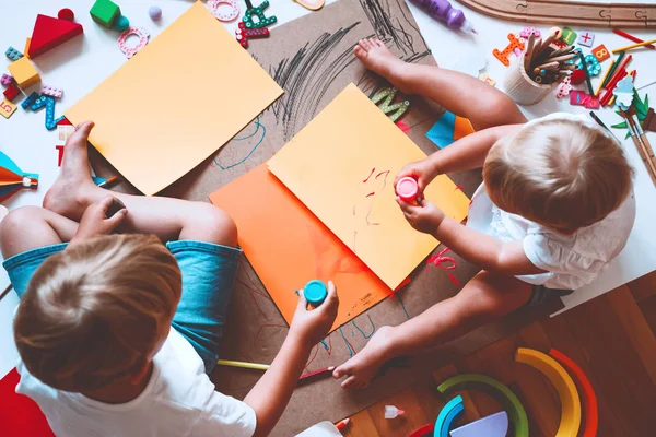 Kids draw and make crafts. Kindergarten or preschool background. — Stock Photo, Image