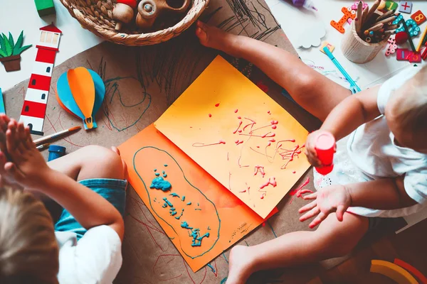 Kids draw and make crafts. Kindergarten or preschool background. — Stock Photo, Image