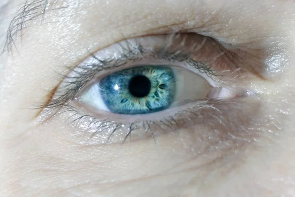 Occhio umano vicino macro come sfondo — Foto Stock