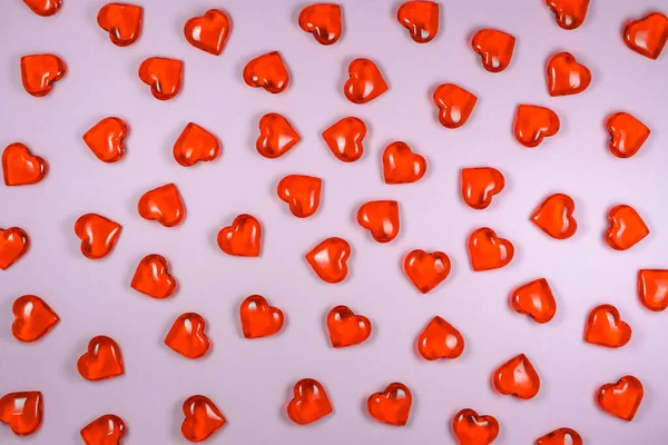 Glass hearts on a purple background macro — Stock Photo, Image