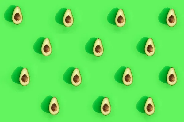 Avocado kleur op een solide achtergrond, de bovenste weergave patroon — Stockfoto