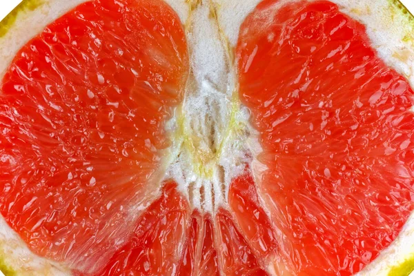 Pomelo cortado sobre un fondo blanco aislado — Foto de Stock