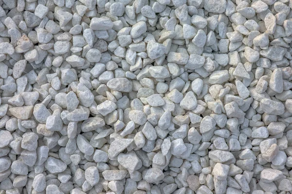 Ściany murowane bruk kamienie jako tło zbliżenie — Zdjęcie stockowe