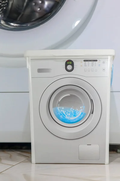 Washing machine close - up as background macro — Stock Photo, Image