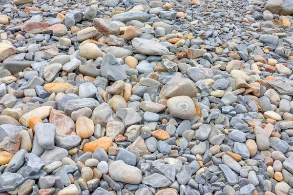 Bakgrund av stenar närbild. mur av sten — Stockfoto