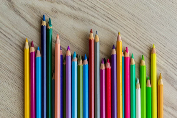 Group Different Length Colored Drawing Pencils Laying Wooden Desk Background — Stock Photo, Image