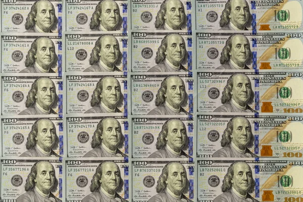 Montón de billetes de dólar americano de nuevo diseño como fondo. Punto de vista superior —  Fotos de Stock