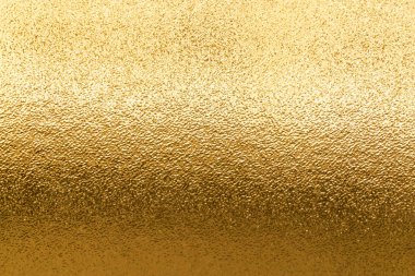 Parlak sarı metalik altın yaprak folyo doku arka plan