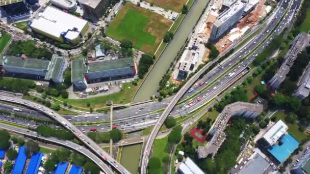 Panoramic aerial footage of a huge network of flyovers, junctions, intersections, roads, bridges etc in Zhengzhou, urban China. — Stock Video