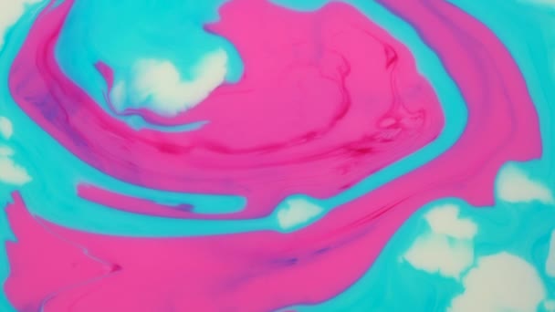 Mixing blue and pink paint, butter and milk — Stock Video