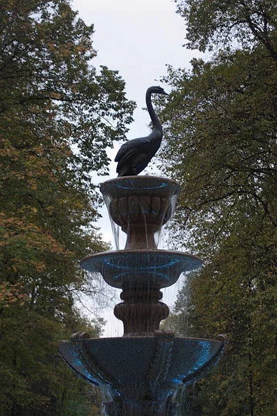 fountain with a bird figure at the top