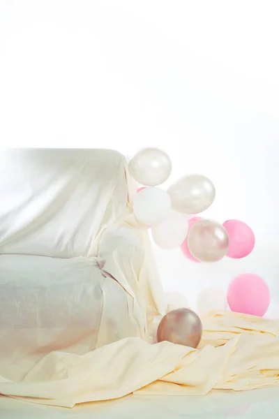 Interior with balloons and sofa — Stock Photo, Image