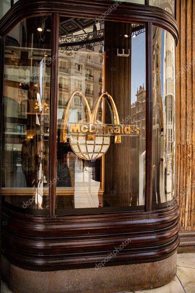 Golden arches. Famous McDonalds arches on a facade. fast food in madrid, spain 08.06.2025