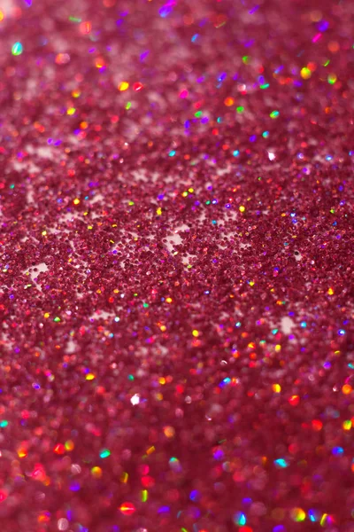 abstract Pink glitter background with multicolored bokeh