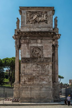 Side of the Arch of Constantine in Rome, Italy clipart
