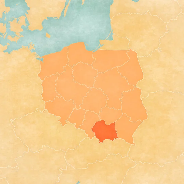 Lesser Poland on the map of Poland in soft grunge and vintage style, like old paper with watercolor painting.