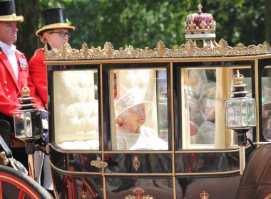 Queen Elizabeth, London, UK - 8/6/19 : Queen Elizabeth travels to Buckingham Palace in carriage, trooping the colour stock photo photograph image clipart