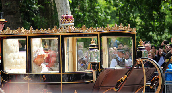 Queen Elizabeth, London, UK - 8/6/19 : Queen Elizabeth travels to Buckingham Palace in carriage, after inspecting the guards on Birthday trooping the colour stock photo photograph image. 