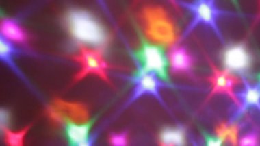 Disko ışıkları 80 'lerin tarzında lunaparkta sönmüş bokeh arkaplan stok görüntülerinde gökkuşağı 