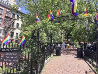 The Stonewall National Monument is a small public park dedicated at the location of the 1969 riots in New York City that was the beginning of the LGBTQ rights movement. clipart