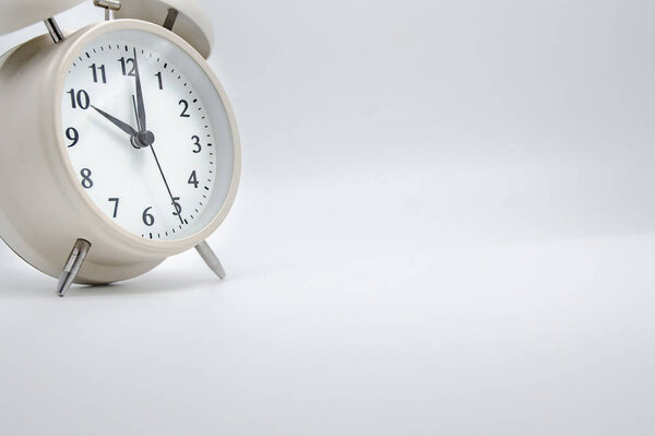 White Alarm Clock isolated Placed on a white background.