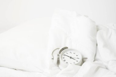 White Alarm Clock isolated Placed on a white background.