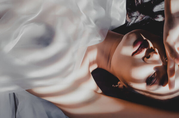 Beautiful and sexy women don't wear clothes.photos of nude female art.Do not focus on objects.Blurred image for background use