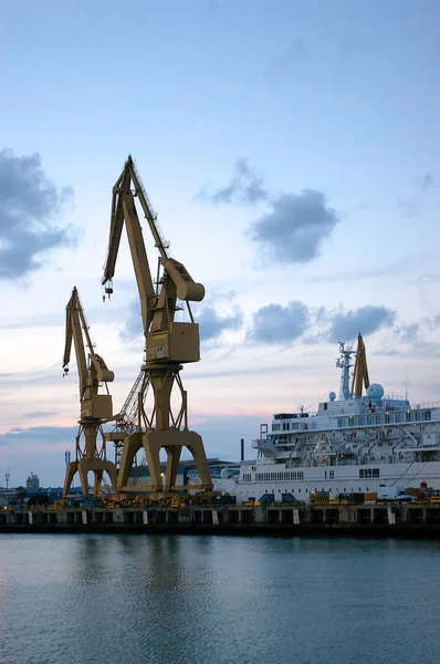 Crane to repair boats in the bay of Cdiz capital, Andalucia. Spain. Europe