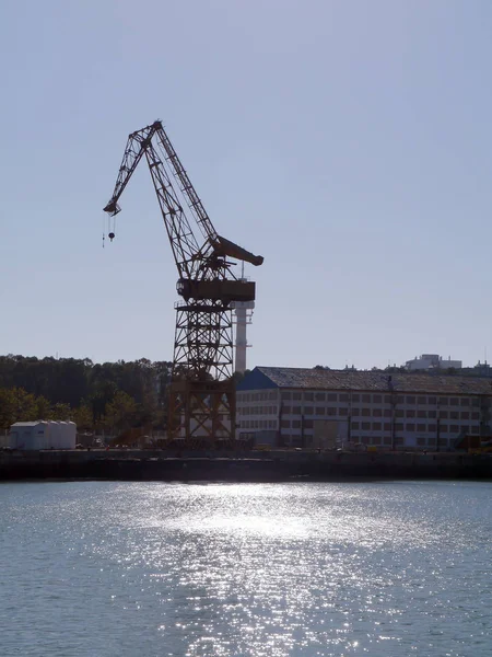 Cranes to repair boats in the bay of Cadiz capital, Andalusia. Spain. Europe