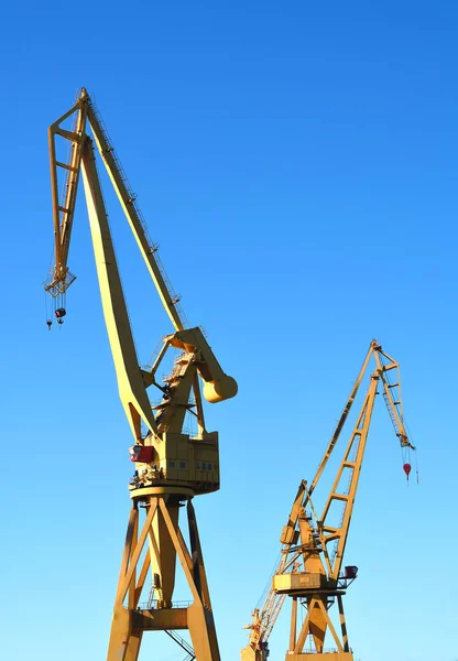 Cranes to repair boats on the coast of the capital city of Cadiz. Andalusia. Spain. Europe.