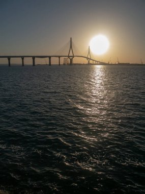 sunrise on the Constitution bridge, called La Pepa, in the Bay of Cdiz, Andalusia. Spain. Europe clipart