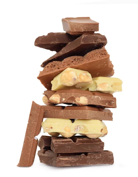 Coklat bagian berasortasi dalam stack terisolasi di atas putih — Stok Foto