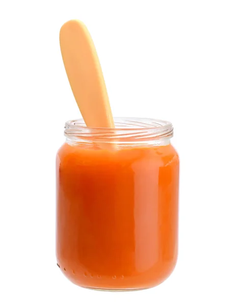 Морковное пюре в банке или стекле, изолированном на белом — стоковое фото